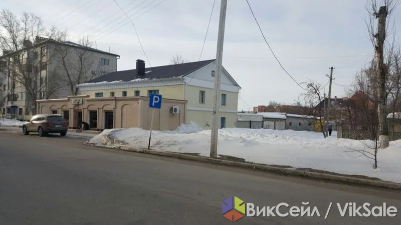Дом с двориком и охраной в центре — под офис или производство
