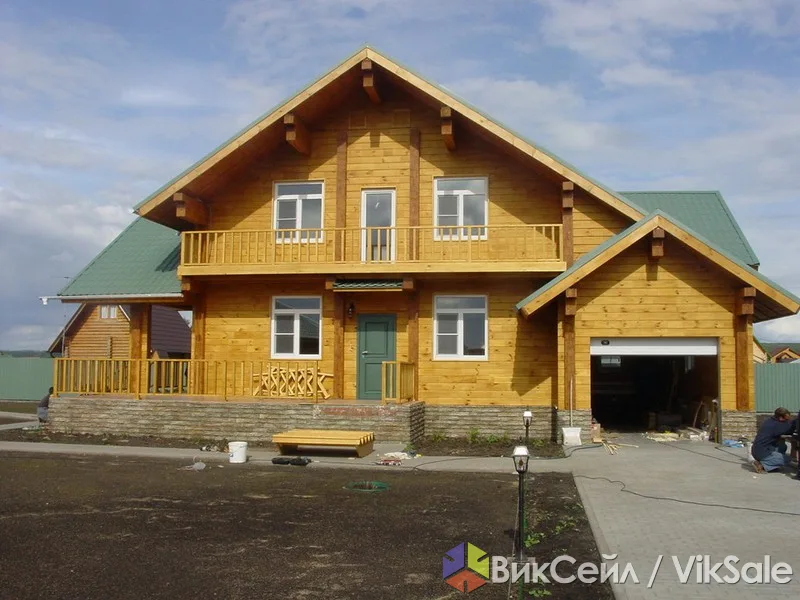 Строительство домов из оцилиндрованного бревна и клееного бруса под ключ