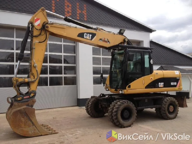 Аренда колесного экскаватора CAT 318 D с оператором