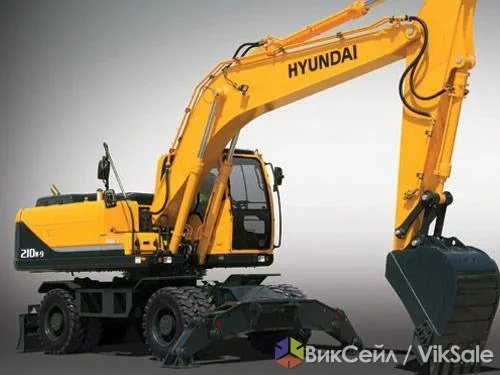Колесный экскаватор HYUNDAI R210W-9S — услуги земляных работ