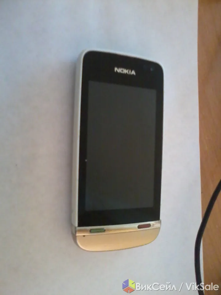 Мобильный телефон Nokia Asha 311 с документами и наушниками