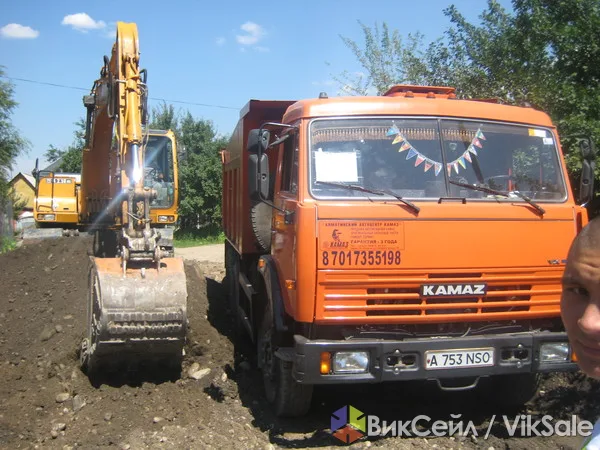 Услуги экскаватора и самосвалов в Холмске